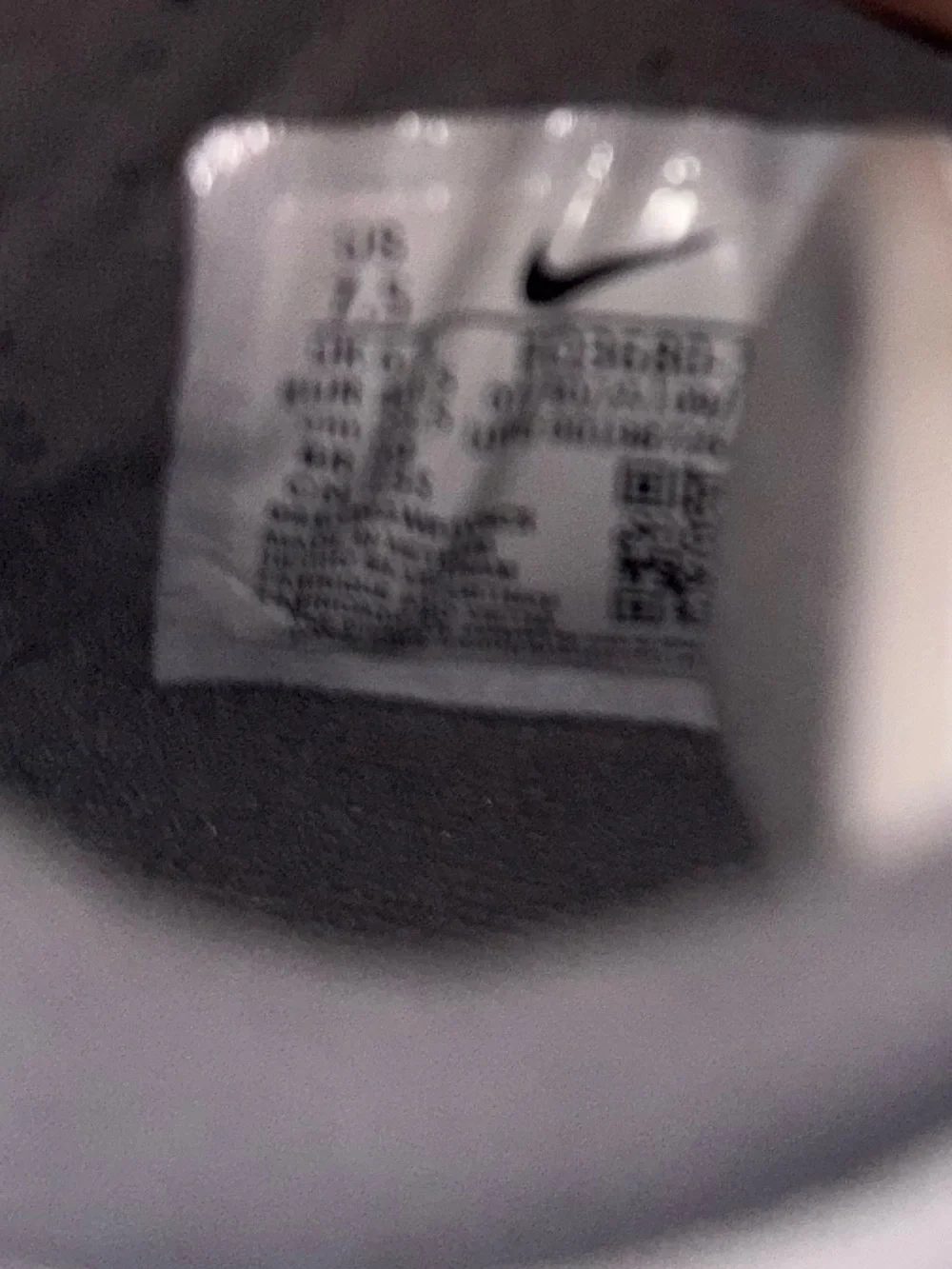 Nike Kids White Sneakers with Orange and Black Swoosh and Gray Collar
